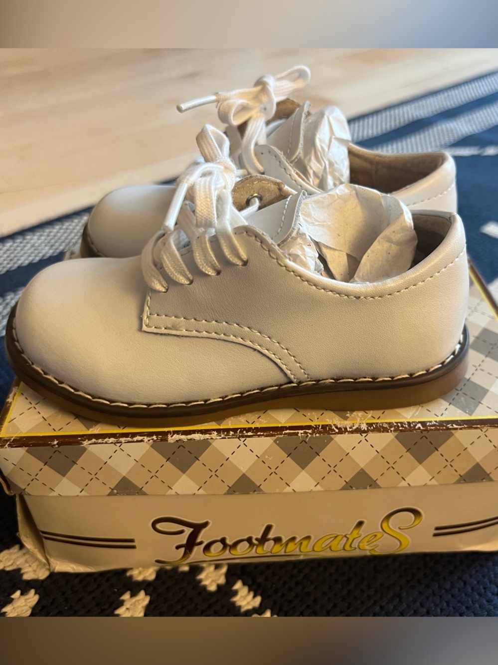 Classic White leather bucks for a little boy.